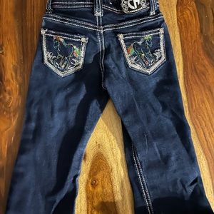 Adorable cowgirl jeans.